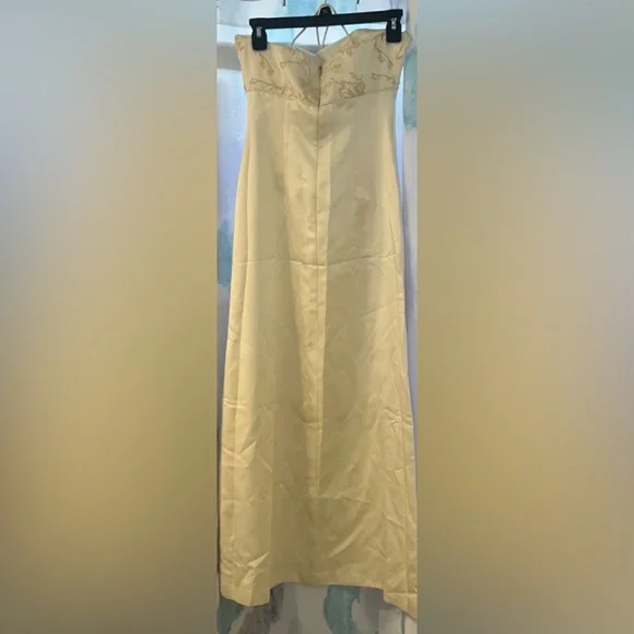 Ivory/cream dress with spaghetti straps and a zipper in the back. Gently used. - Picture 3 of 11